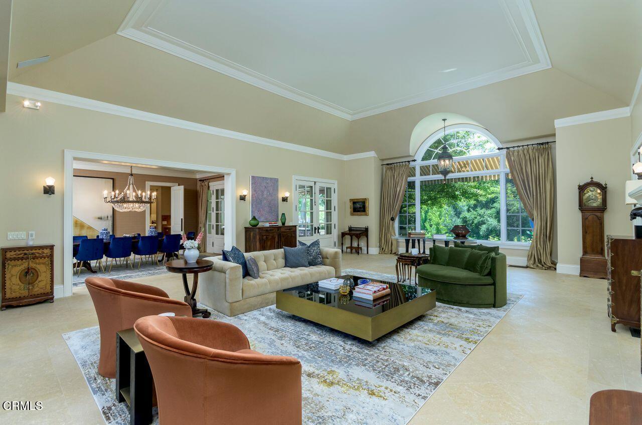 520 Georgian Road La Canada Flintridge, CA 91011 - Photo 11 of 75 a living room with furniture and a large window