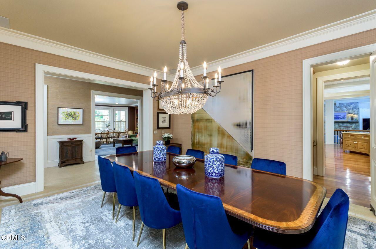 520 Georgian Road La Canada Flintridge, CA 91011 - Photo 13 of 75 a view of a dining room with furniture a chandelier and wooden floor