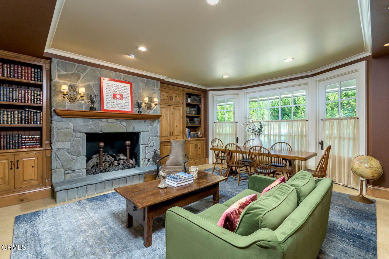 520 Georgian Road La Canada Flintridge, CA 91011 - Photo 21 of 75 a living room with furniture and a fireplace