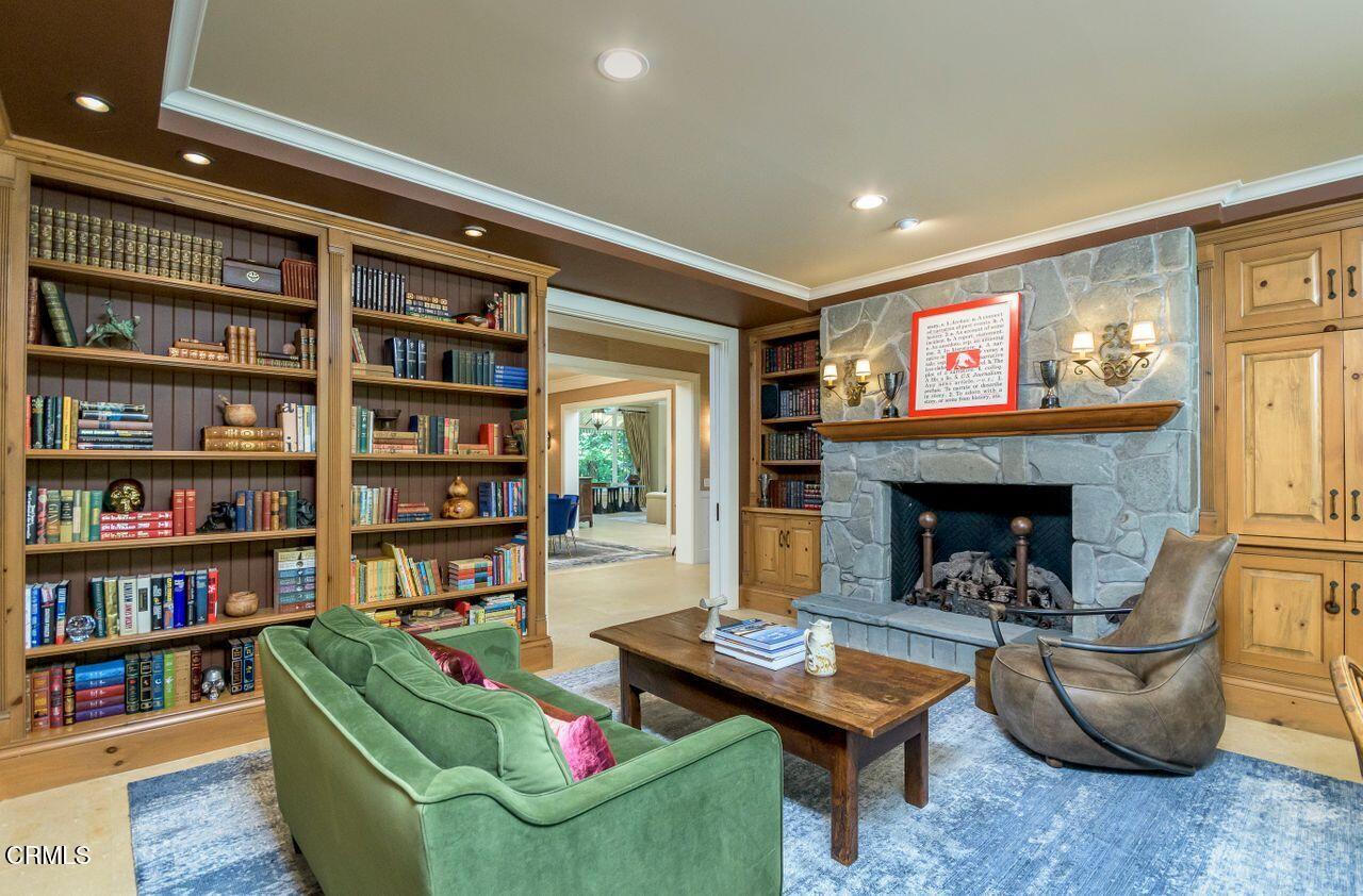 520 Georgian Road La Canada Flintridge, CA 91011 - Photo 23 of 75 a living room with furniture and a fireplace