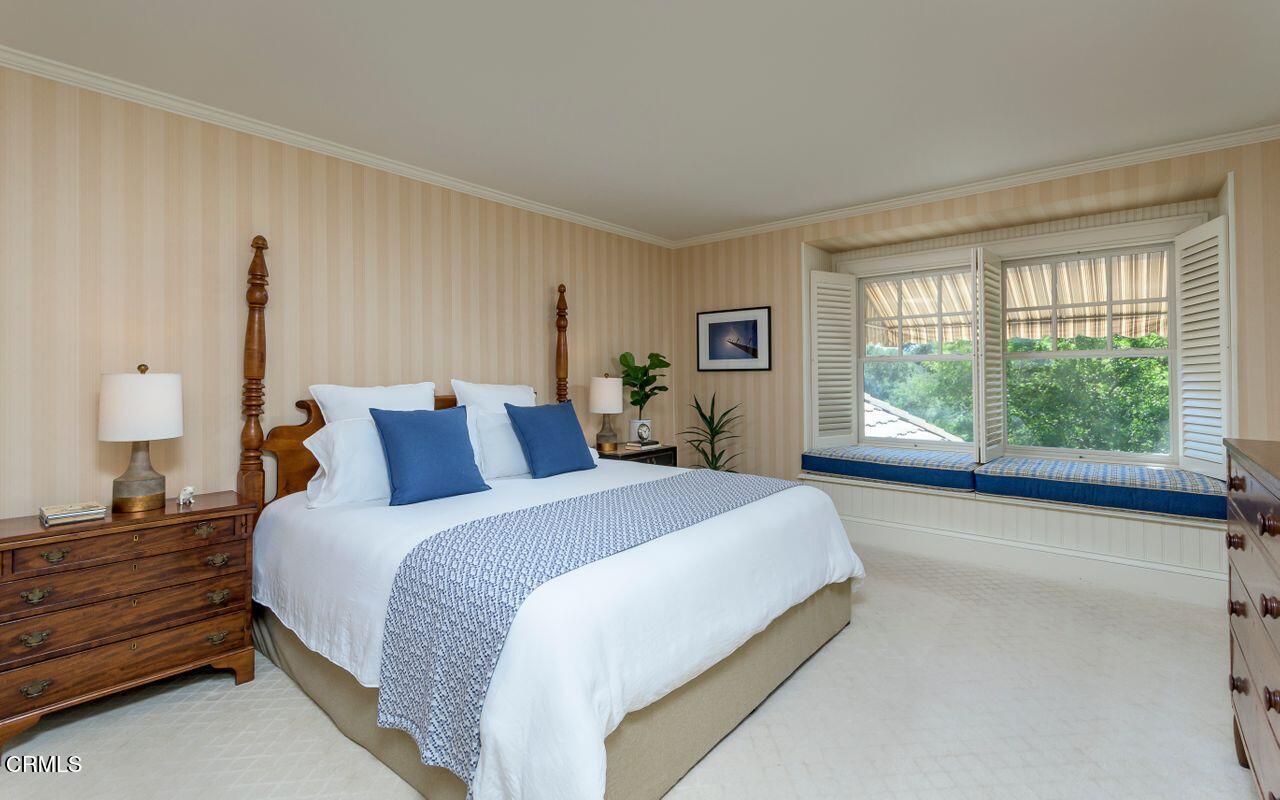 520 Georgian Road La Canada Flintridge, CA 91011 - Photo 35 of 75 a spacious bedroom with a bed and a large window