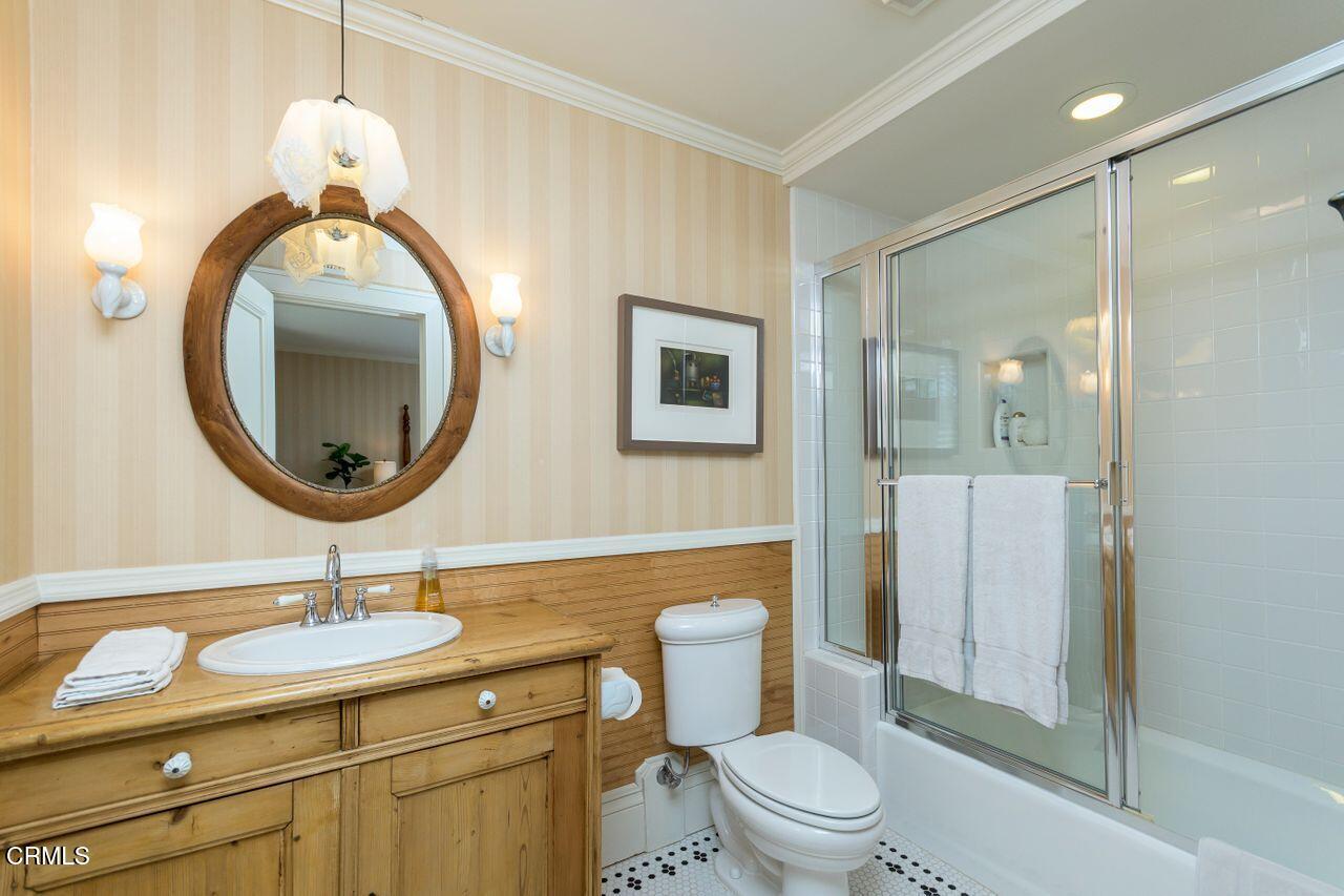 520 Georgian Road La Canada Flintridge, CA 91011 - Photo 36 of 75 a bathroom with a toilet a sink and mirror