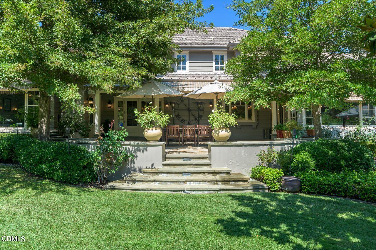 520 Georgian Road La Canada Flintridge, CA 91011 - Photo 47 of 75 a front view of a house with a garden and plants