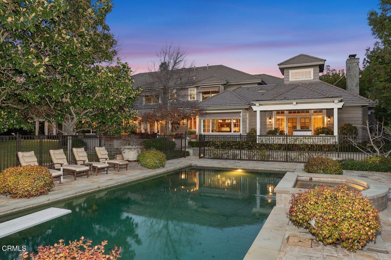 520 Georgian Road La Canada Flintridge, CA 91011 - Photo 49 of 75 a front view of a house with swimming pool having outdoor seating