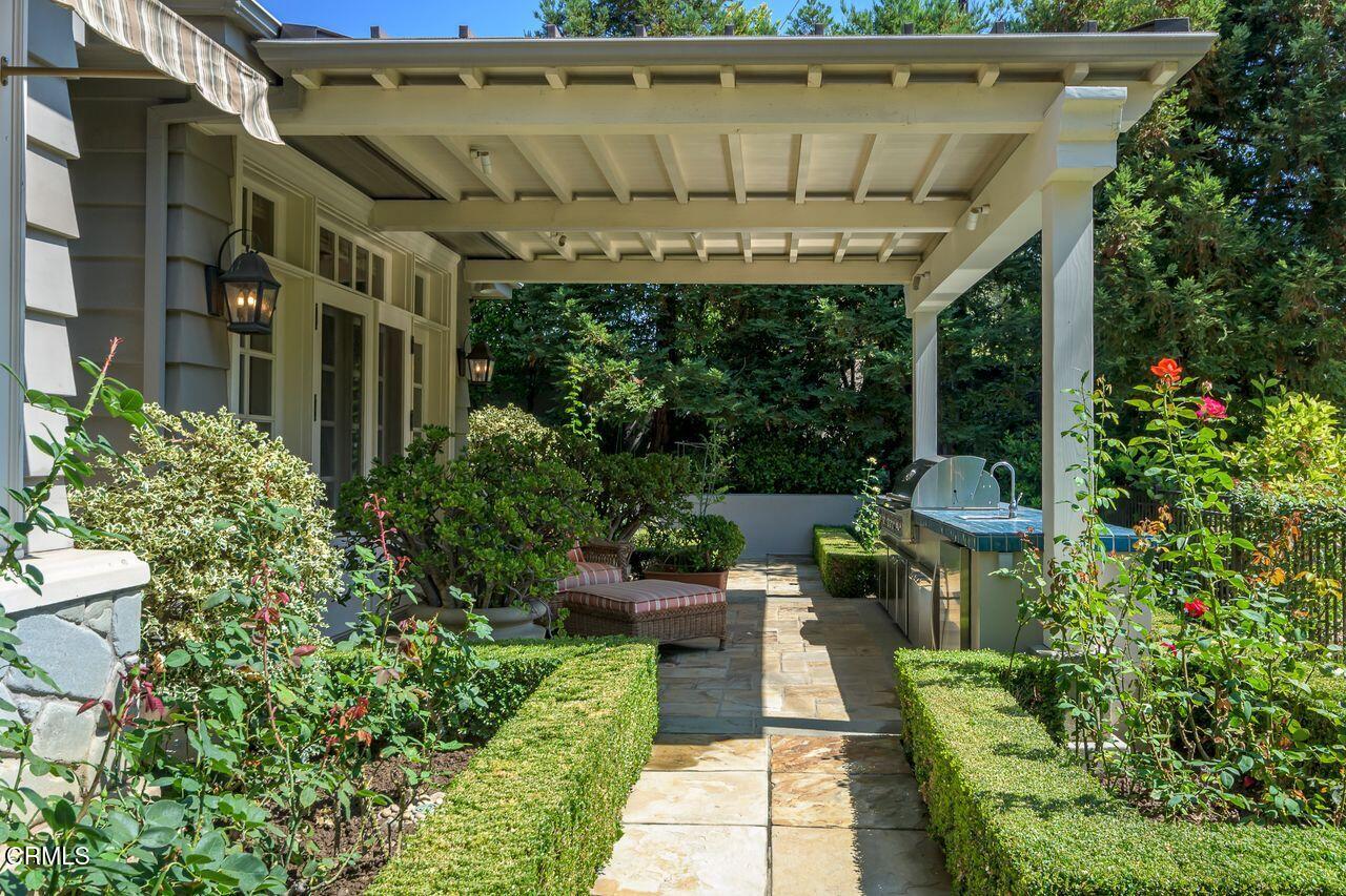 520 Georgian Road La Canada Flintridge, CA 91011 - Photo 60 of 75 a view of a patio with table and chairs potted plants