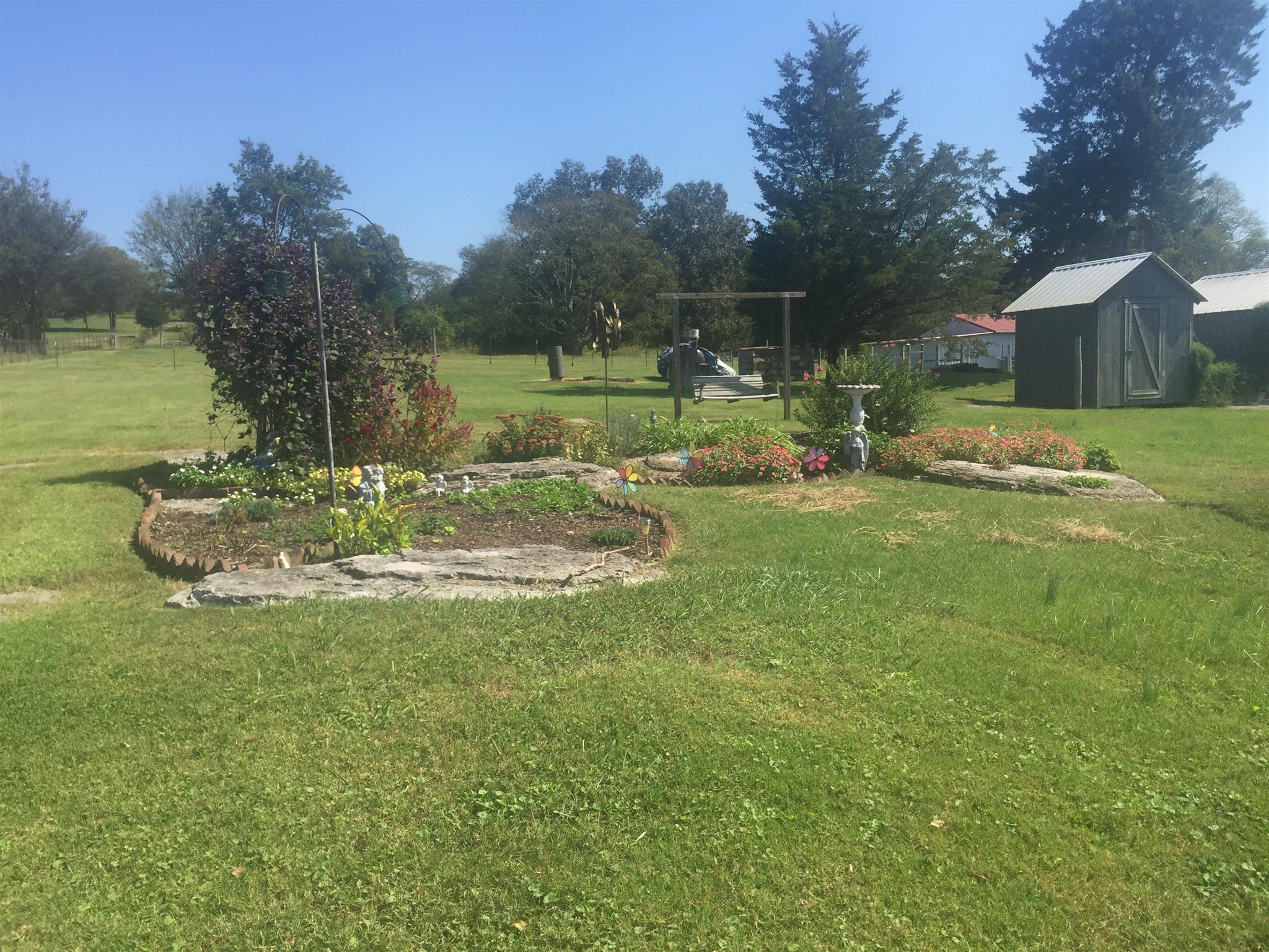 162 Trinity Road Franklin, TN 37067 - Photo 12 of 13 a view of a house with a yard