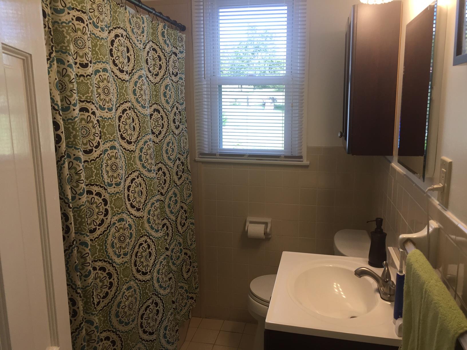 162 Trinity Road Franklin, TN 37067 - Photo 7 of 13 a bathroom with a sink and a mirror