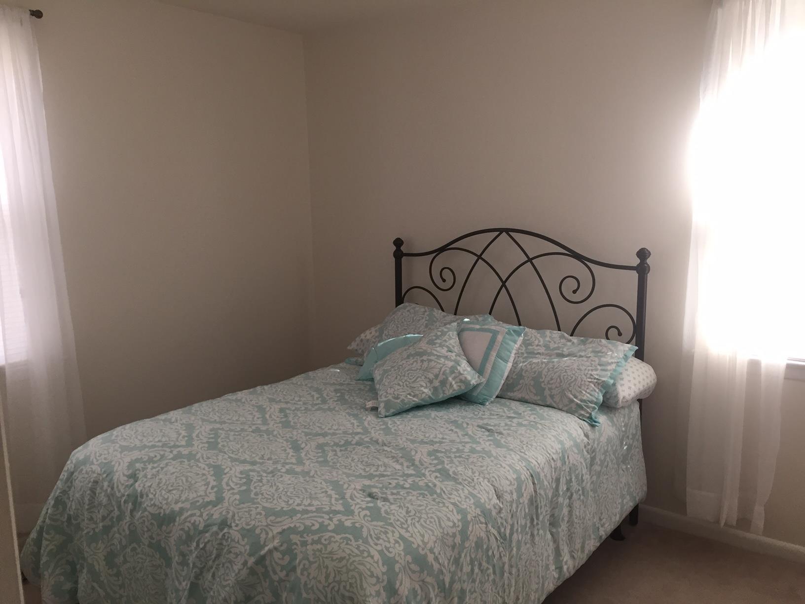 162 Trinity Road Franklin, TN 37067 - Photo 8 of 13 a bedroom with a bed and a window