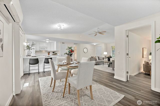 a view of a dining room with furniture