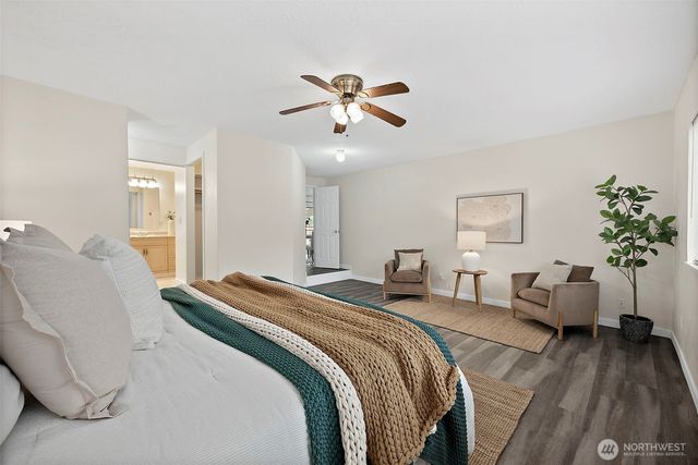 a bedroom with bed and a window