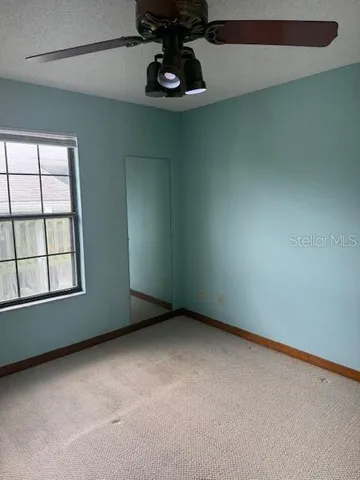 an empty room with closet