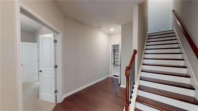 a view of entryway with wooden floor