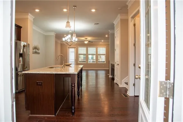 a bathroom with a sink a mirror and shower
