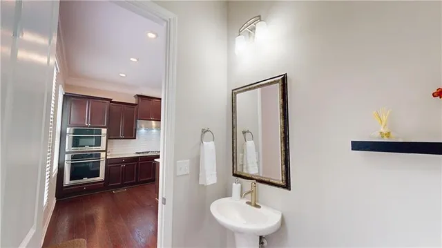 a view of a kitchen from the hallway
