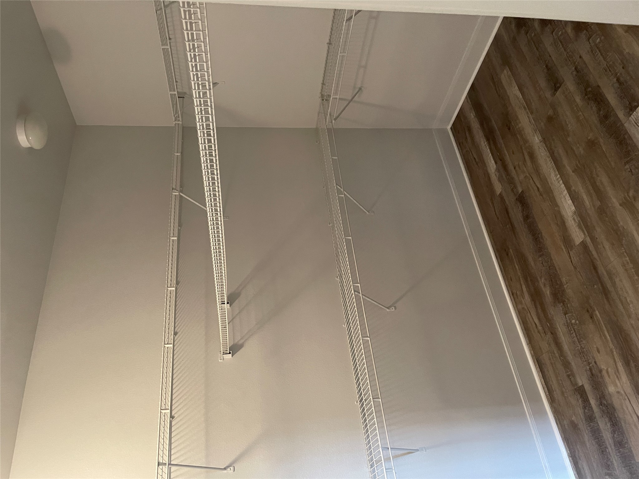 7701 Rialto Boulevard, Unit 822 Austin, TX 78735 - Photo 14 of 22 a view of a room with racks on the wall