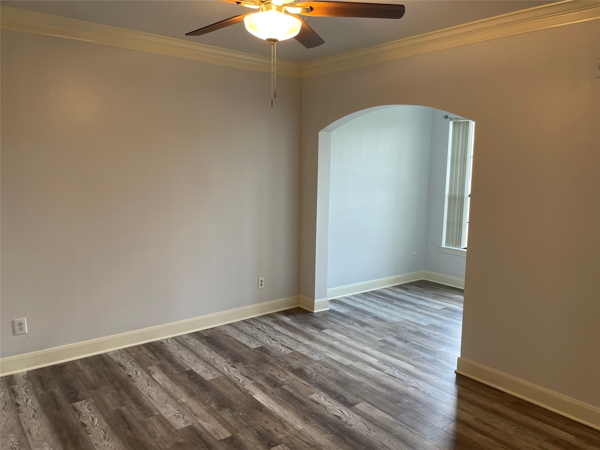 7701 Rialto Boulevard, Unit 822 Austin, TX 78735 - Photo 10 of 22 a view of an empty room with wooden floor
