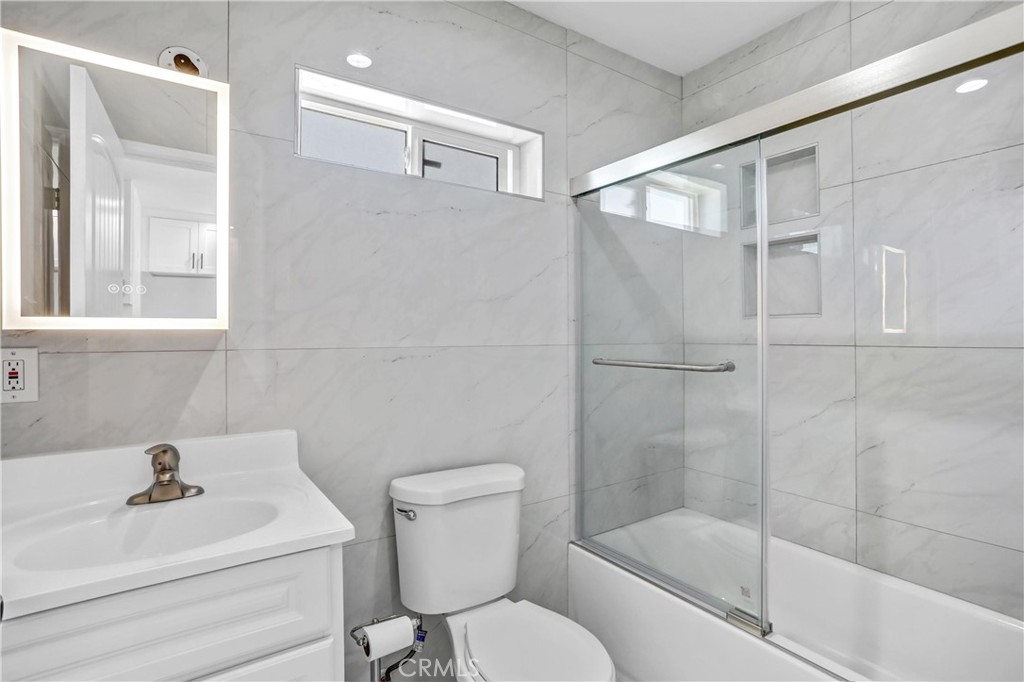 857 South Idyllwild Avenue, Unit 2 Rialto, CA 92376 - Photo 11 of 16 Bathroom Lighted cabinet