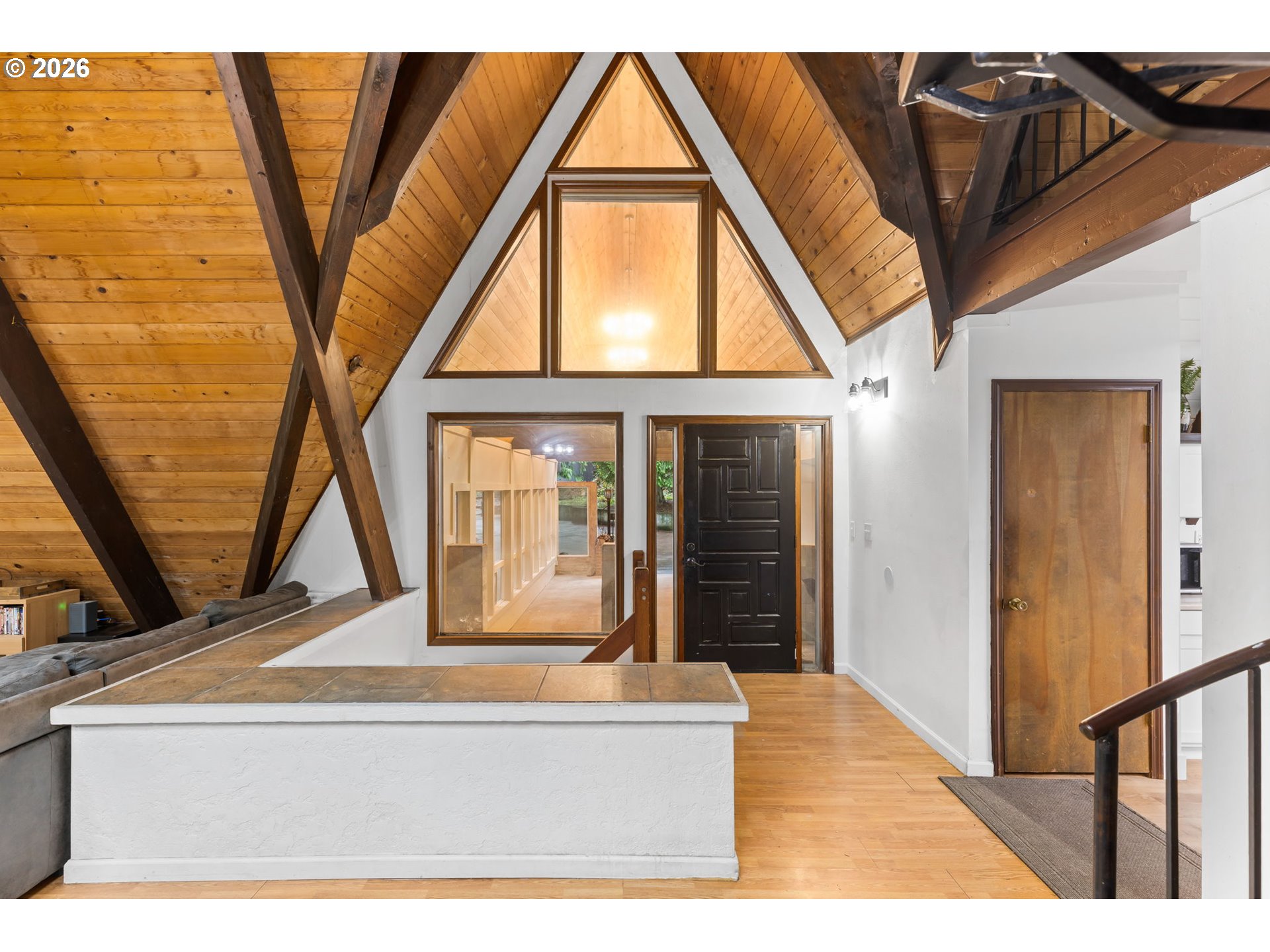 34221 Southeast Colorado Road Sandy, OR 97055 - Photo 15 of 48 a living room with a couch and wooden floor
