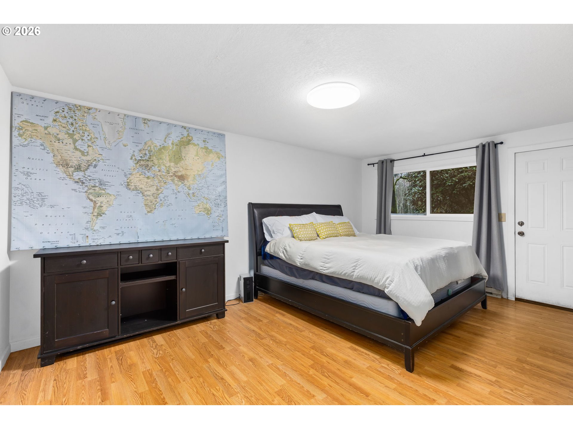 34221 Southeast Colorado Road Sandy, OR 97055 - Photo 24 of 48 a bedroom with a bed and dresser