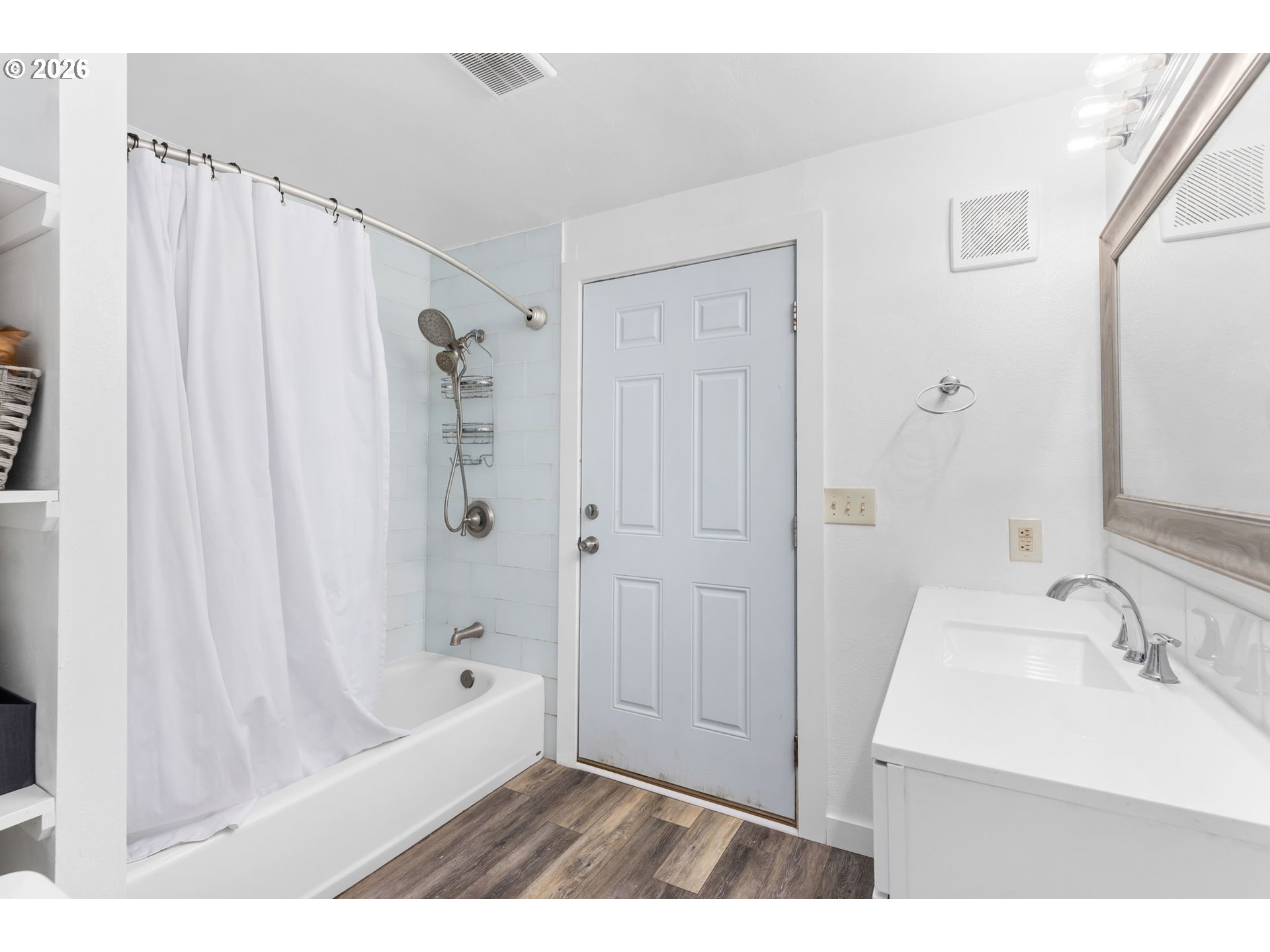 34221 Southeast Colorado Road Sandy, OR 97055 - Photo 29 of 48 a bathroom with a sink a mirror and a bathtub