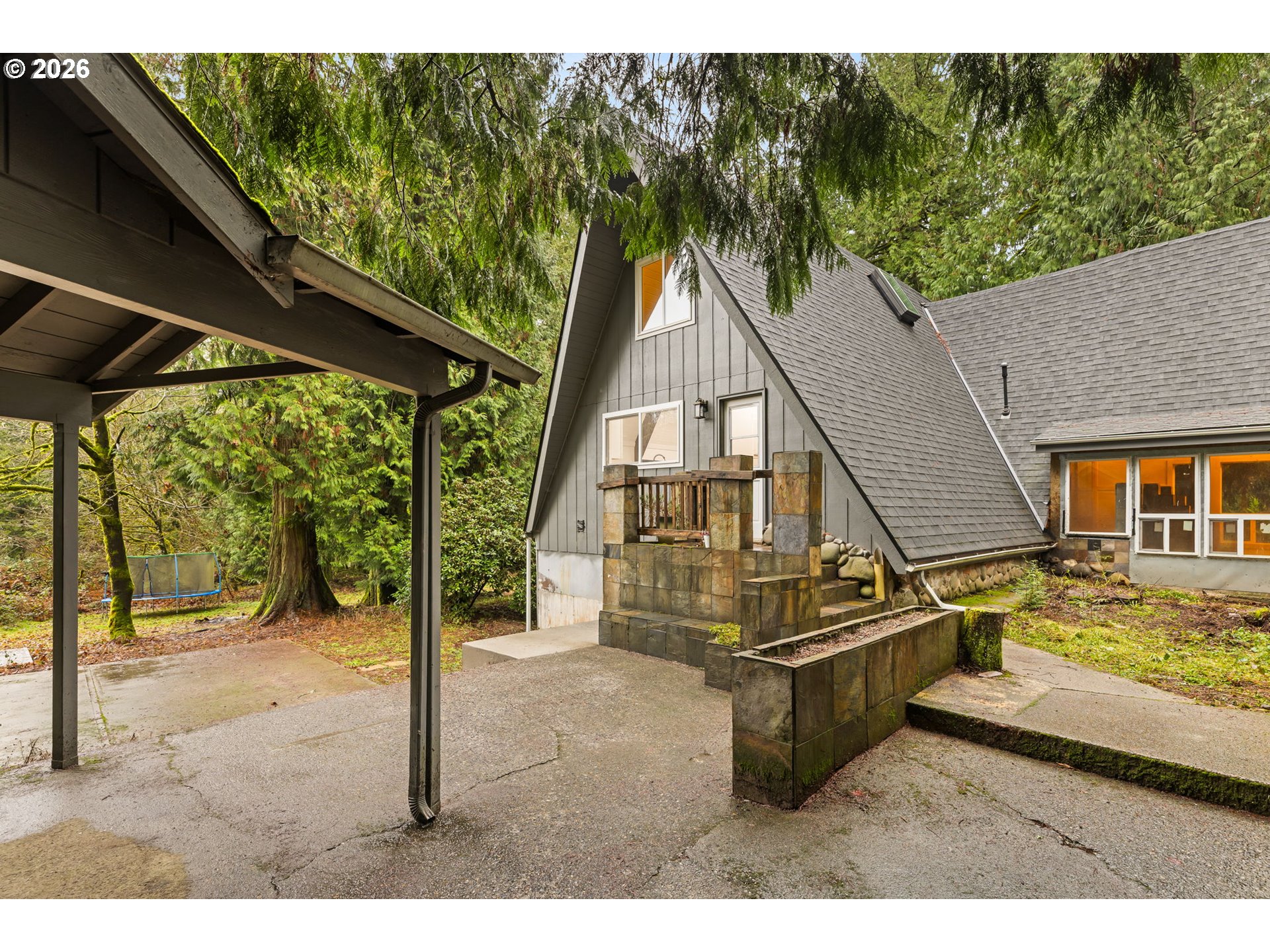 34221 Southeast Colorado Road Sandy, OR 97055 - Photo 34 of 48 a view of a house with a yard balcony and trees