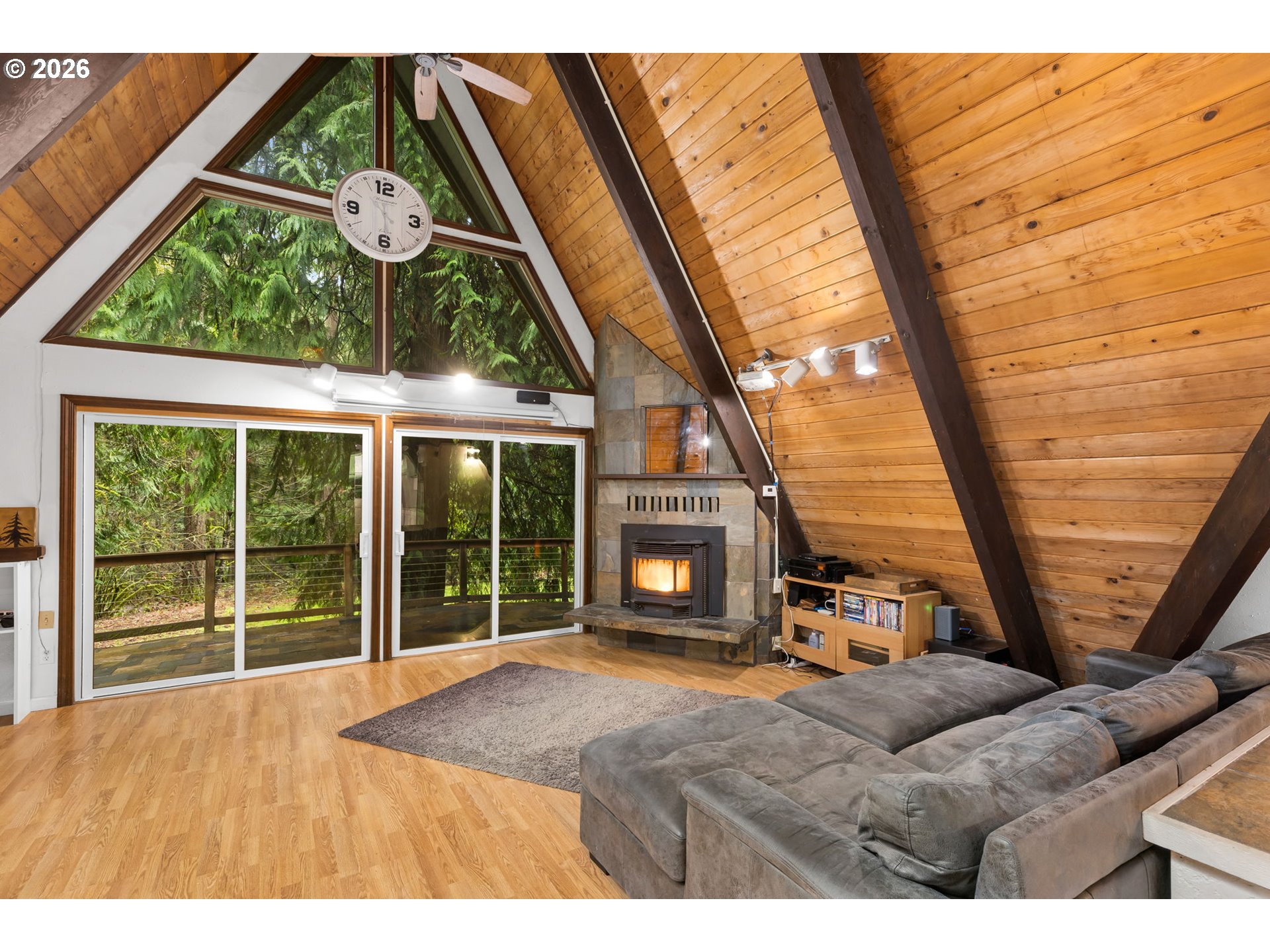 34221 Southeast Colorado Road Sandy, OR 97055 - Photo 10 of 48 a bedroom with furniture and a large window