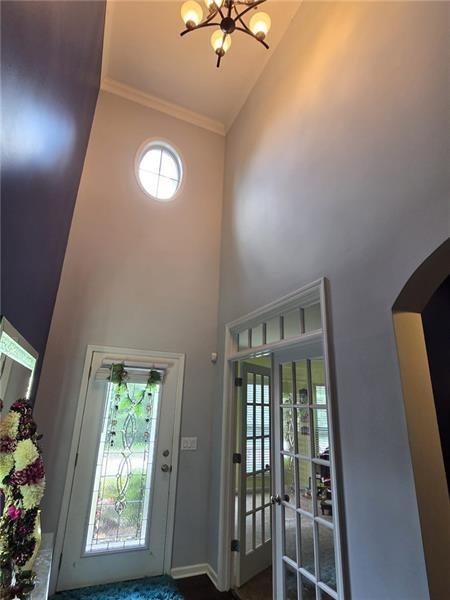 6850 Rocking Horse Lane Cumming, GA 30040 - Photo 2 of 36 a view of an entryway with a window