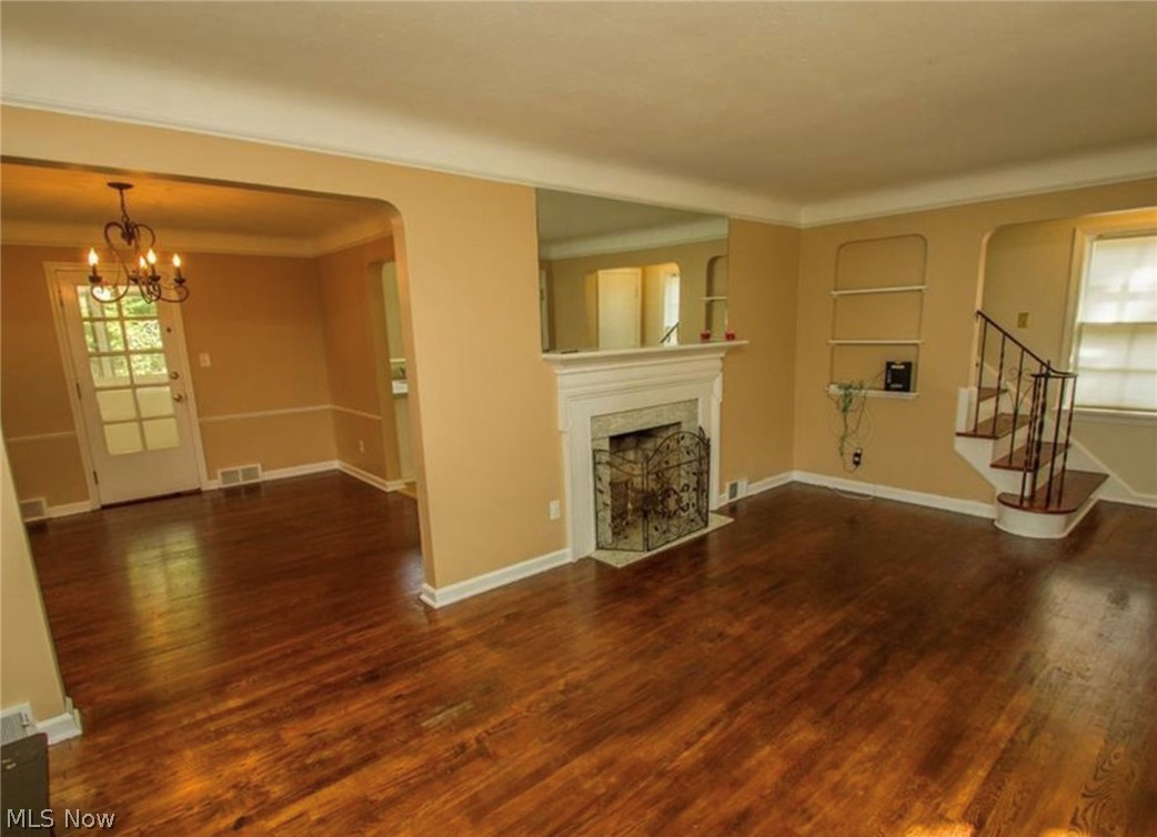 3563 Woodridge Road Cleveland Heights, OH 44121 - Photo 5 of 20 The Living Room looking through the arch towards the Dining Room