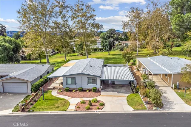 an aerial view of a house with a garden