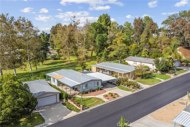 an aerial view of a house with a garden