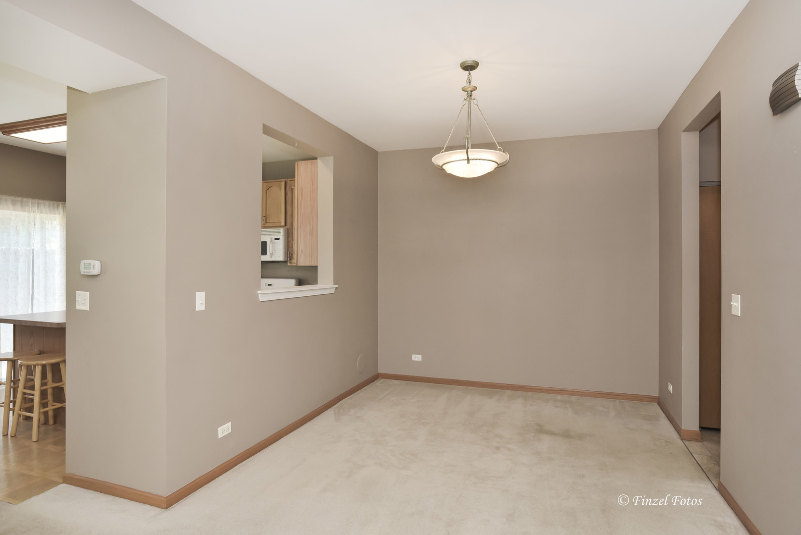 1931 South Cedar Lake Road Round Lake, IL 60073 - Photo 5 of 16 a view of an empty room with a window