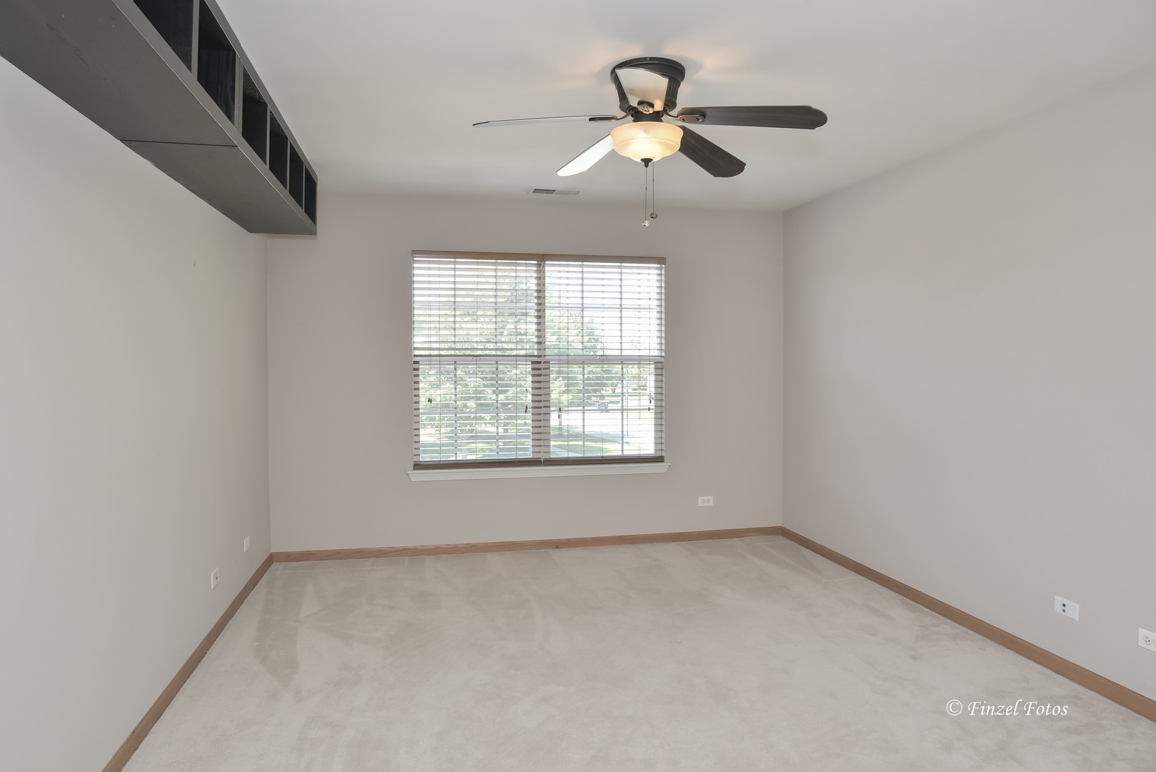 1931 South Cedar Lake Road Round Lake, IL 60073 - Photo 10 of 16 an empty room with a window