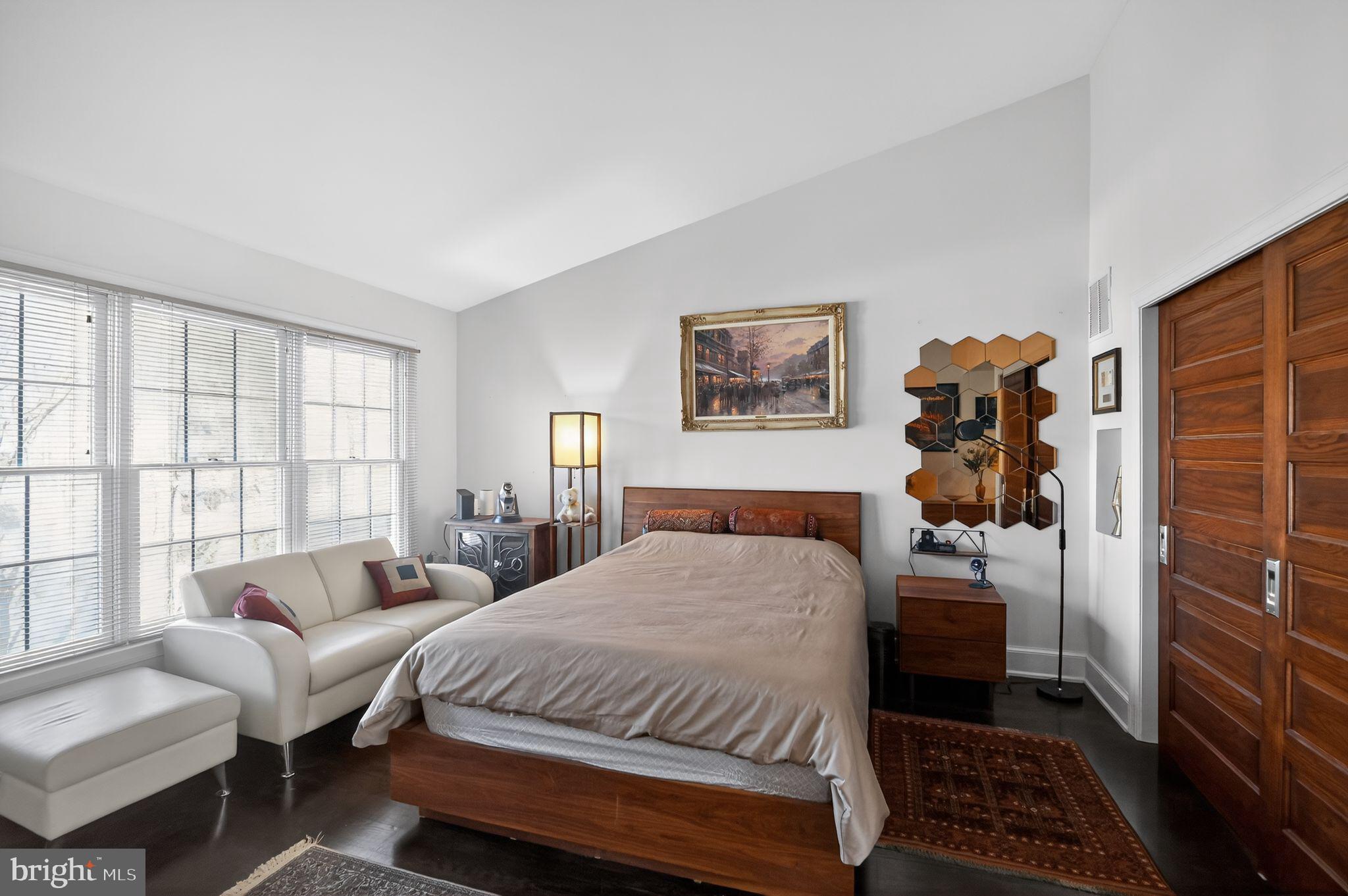 128 Rees Place Falls Church, VA 22046 - Photo 26 of 47 a bedroom with a bed and a couch