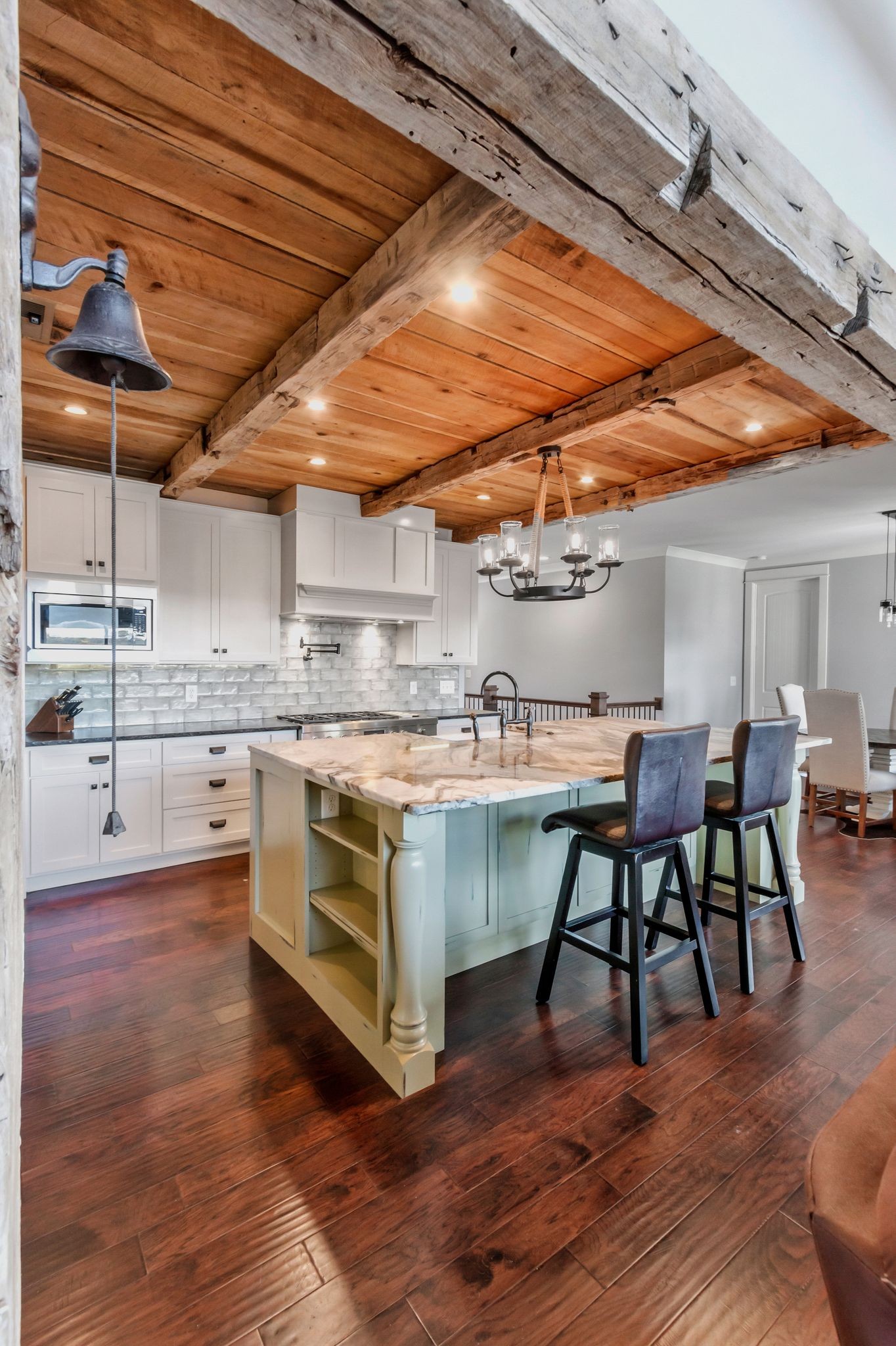 2886 Fly Road Santa Fe, TN 38482 - Photo 12 of 92 a kitchen with a table chairs and wooden floor