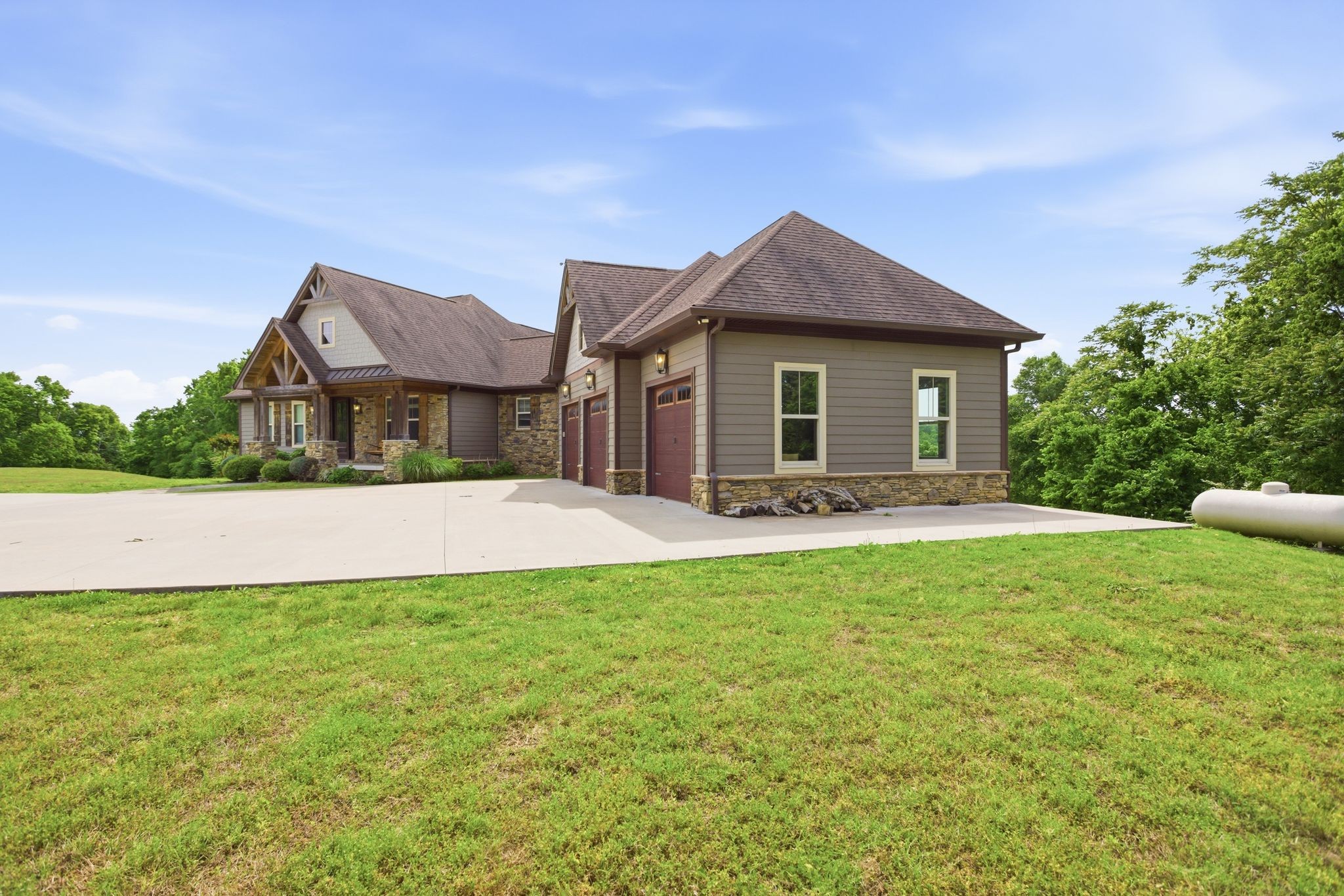 2886 Fly Road Santa Fe, TN 38482 - Photo 12 of 96 a backyard of a house with table and chairs
