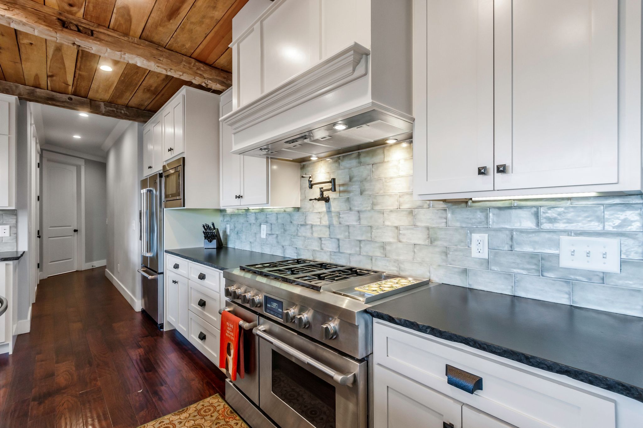 2886 Fly Road Santa Fe, TN 38482 - Photo 16 of 92 a kitchen with stainless steel appliances granite countertop a stove and a refrigerator
