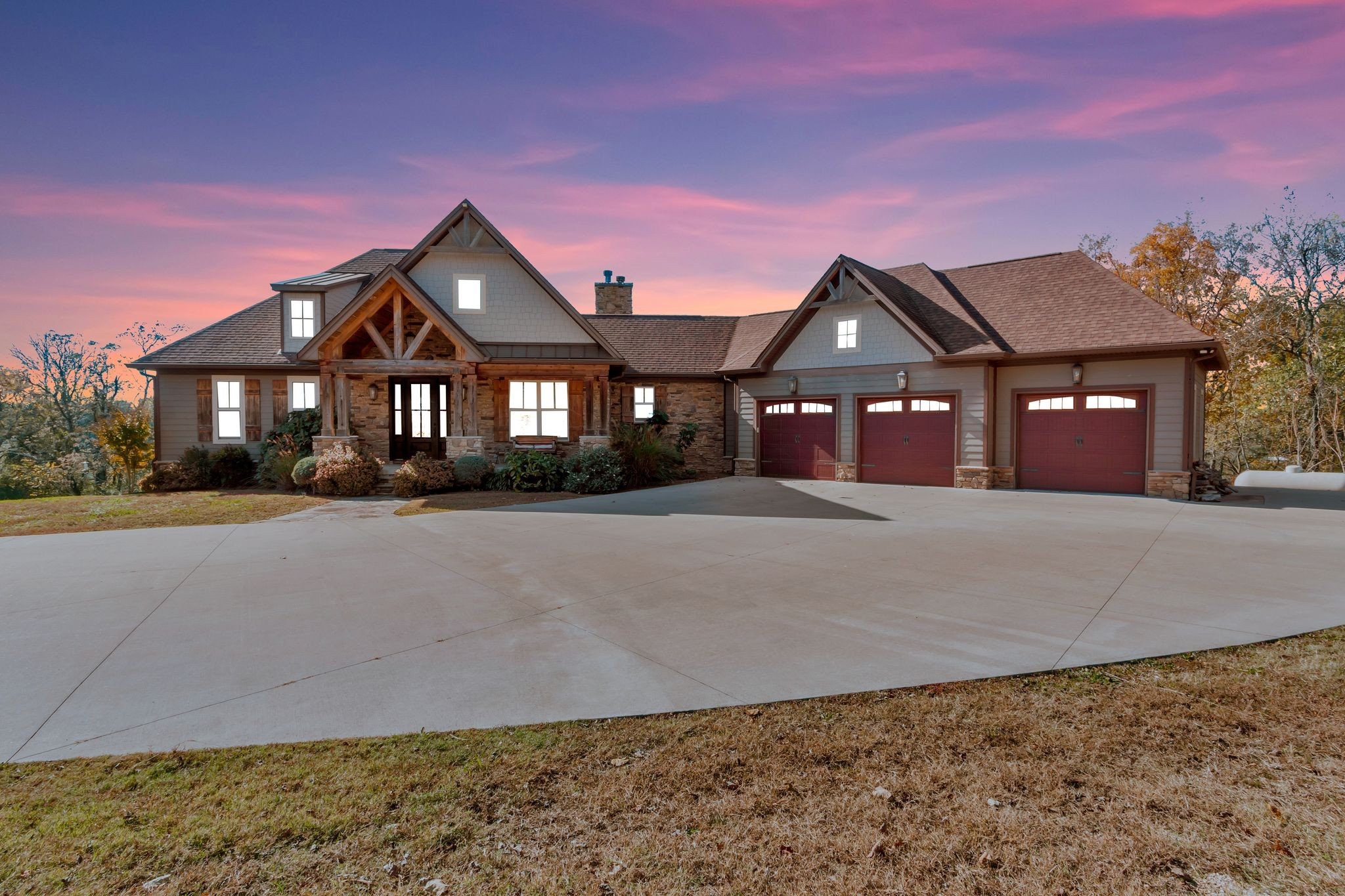 2886 Fly Road Santa Fe, TN 38482 - Photo 4 of 92 a front view of a house with a yard and garage