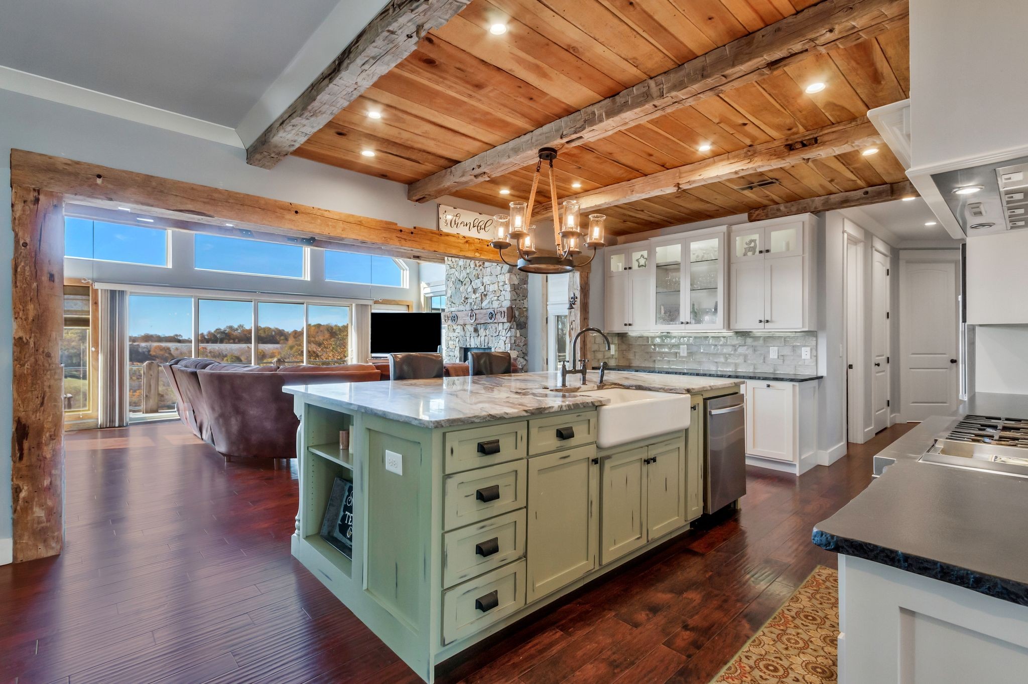 2886 Fly Road Santa Fe, TN 38482 - Photo 9 of 92 a kitchen with stainless steel appliances granite countertop a sink a stove and a wooden floors