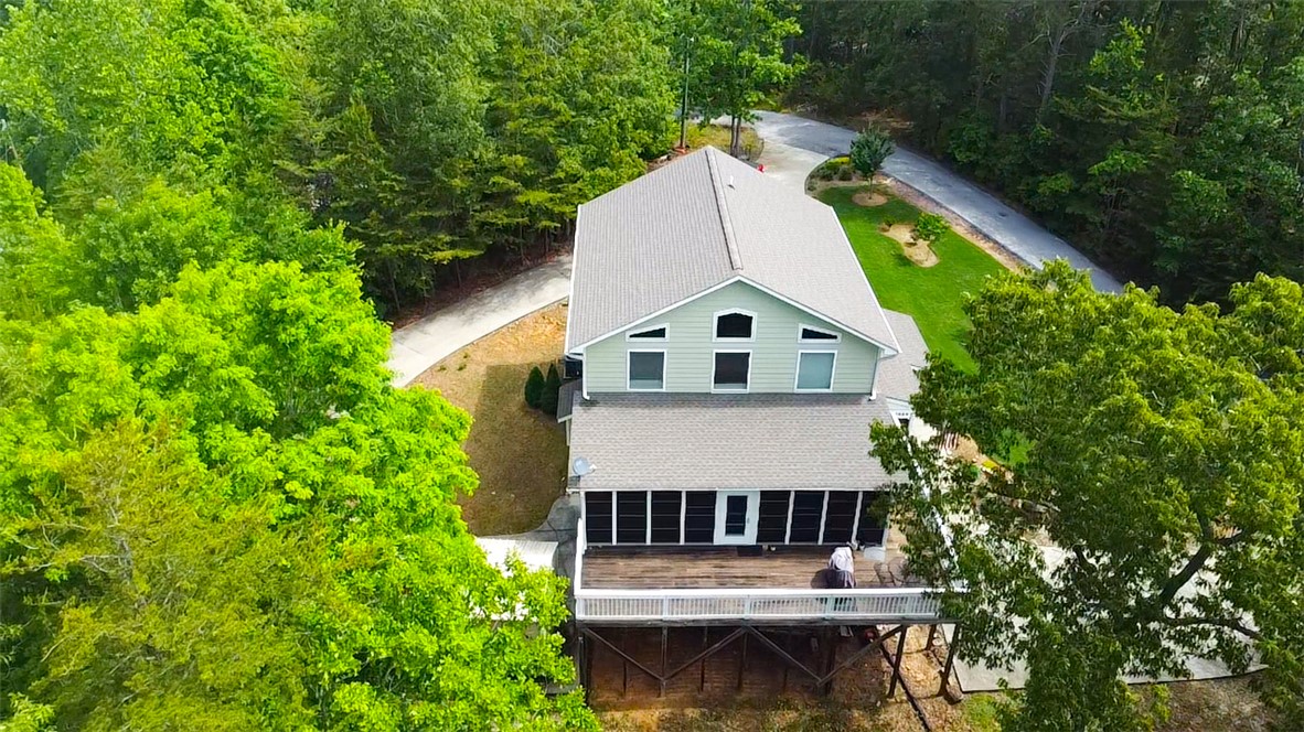 608 McKinney Way Westminster, SC 29693 - Photo 32 of 34 Perched amidst lush woodlands, this inviting home features a large rear deck for outdoor enjoyment.