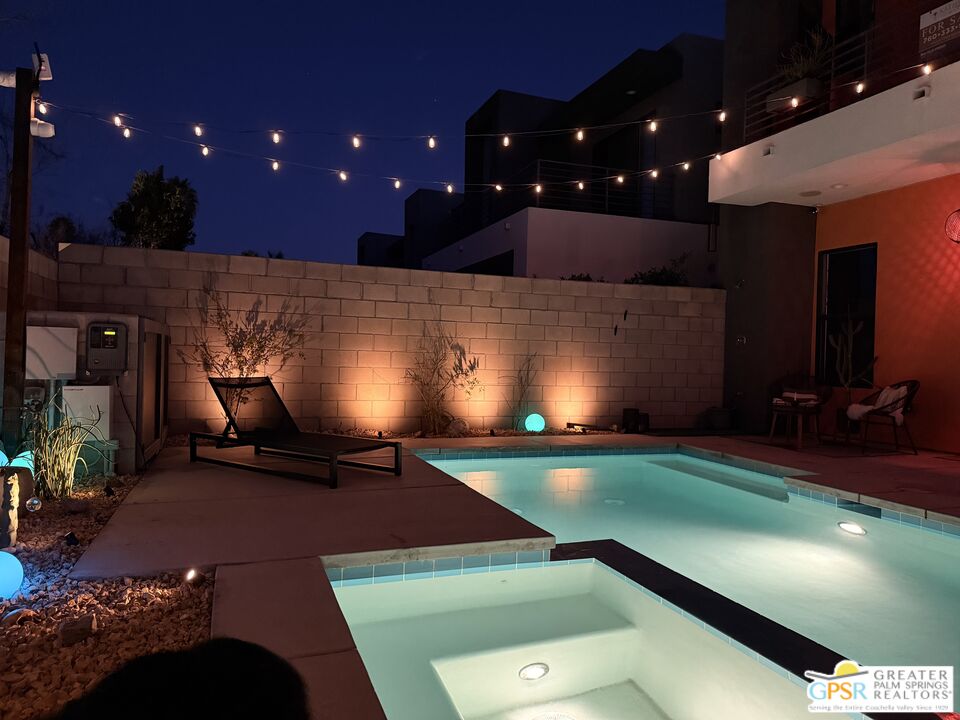 482 Paragon Loop Palm Springs, CA 92262 - Photo 16 of 24 a view of a room with gym equipment