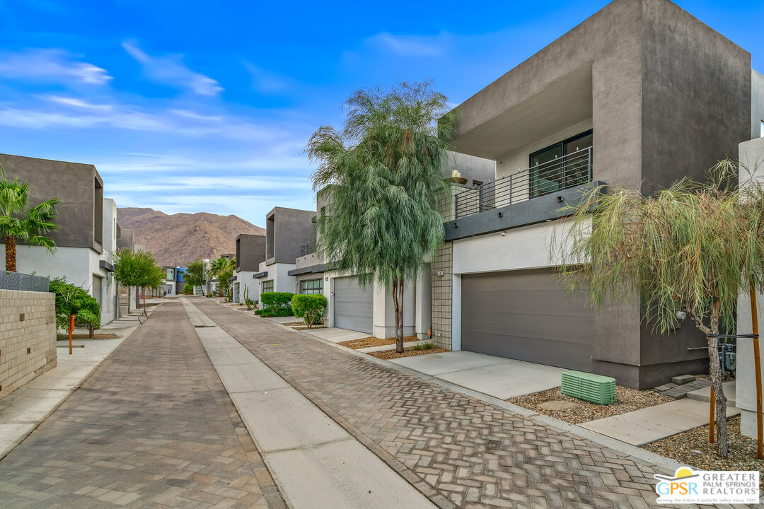 482 Paragon Loop Palm Springs, CA 92262 - Photo 22 of 24 a view of a street with a house