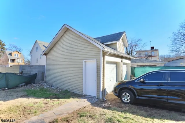a car parked in front of a house