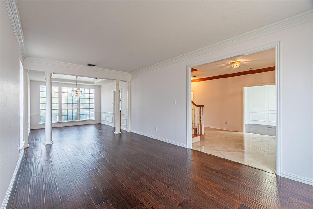 1907 New Haven Road Grapevine, TX 76051 - Photo 12 of 34 an empty room with wooden floor and a window