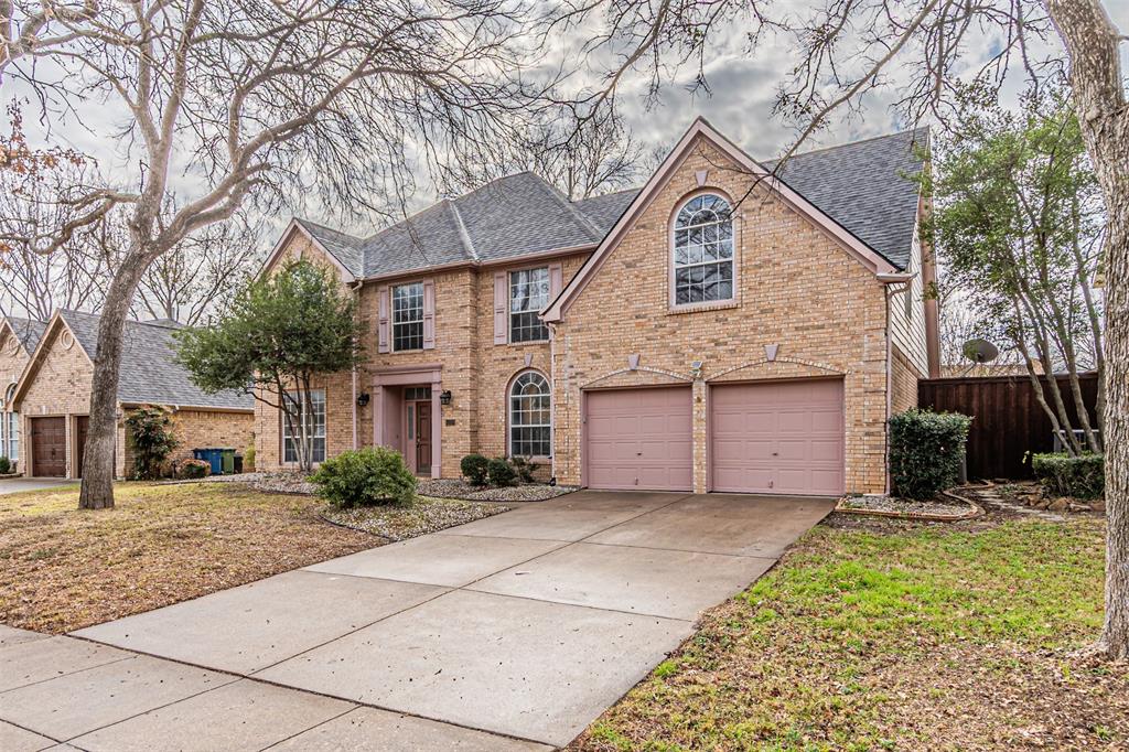 1907 New Haven Road Grapevine, TX 76051 - Photo 2 of 34 a front view of a house with a yard
