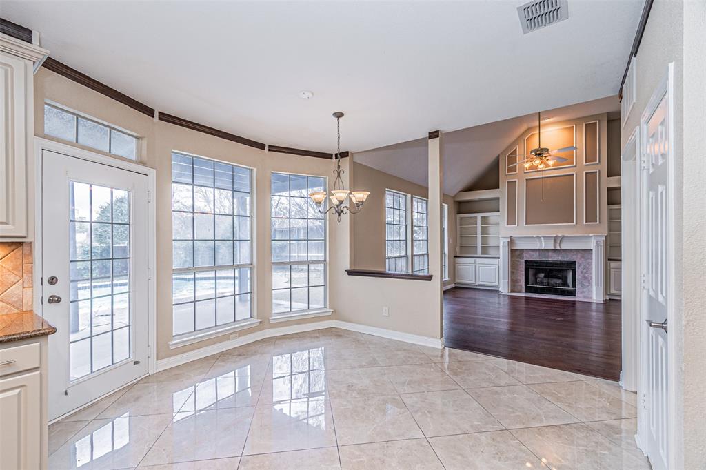 1907 New Haven Road Grapevine, TX 76051 - Photo 10 of 34 a view of an empty room with furniture and a fireplace