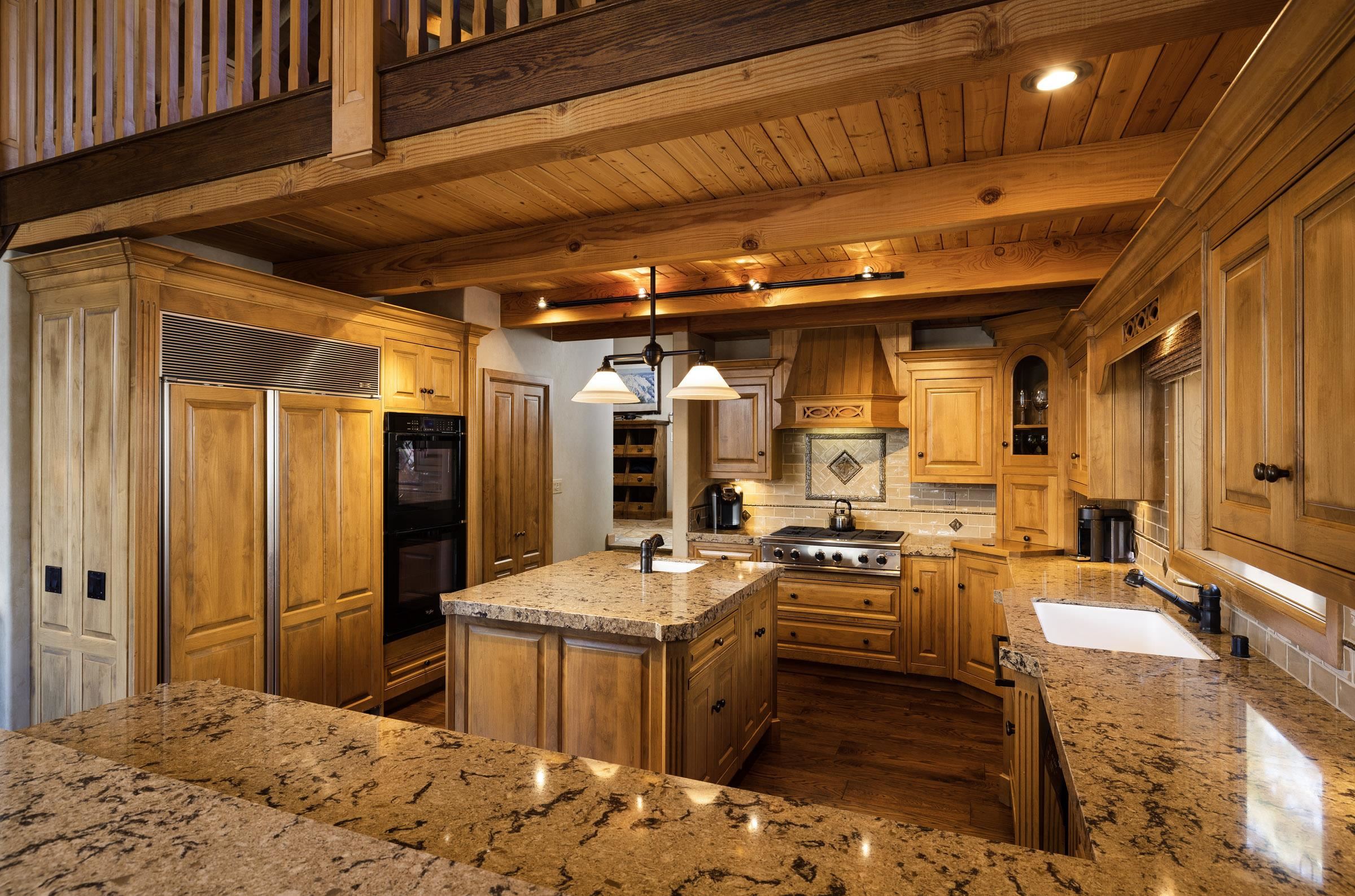 285 Juniper Road Mammoth Lakes, CA 93546 - Photo 14 of 38 a kitchen with granite countertop lots of counter top space