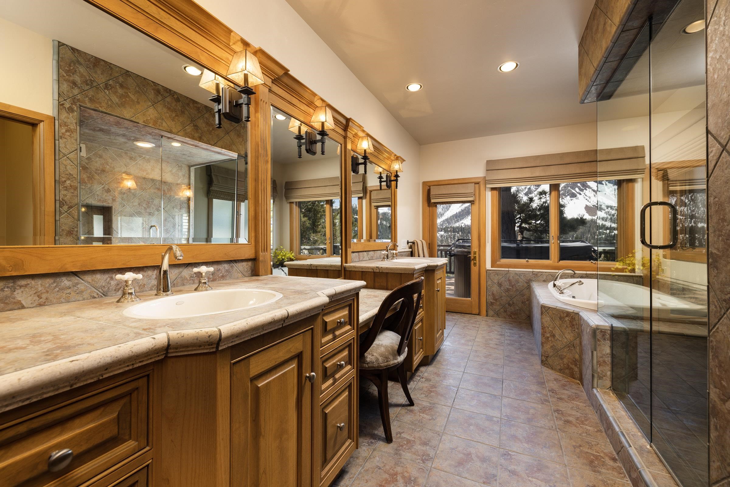 285 Juniper Road Mammoth Lakes, CA 93546 - Photo 18 of 38 a kitchen with stainless steel appliances granite countertop a sink and a counter