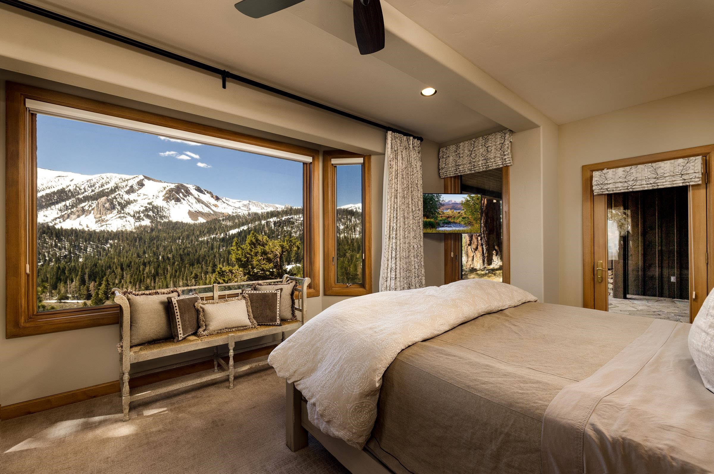 285 Juniper Road Mammoth Lakes, CA 93546 - Photo 23 of 38 a bed room with a bed and a large window