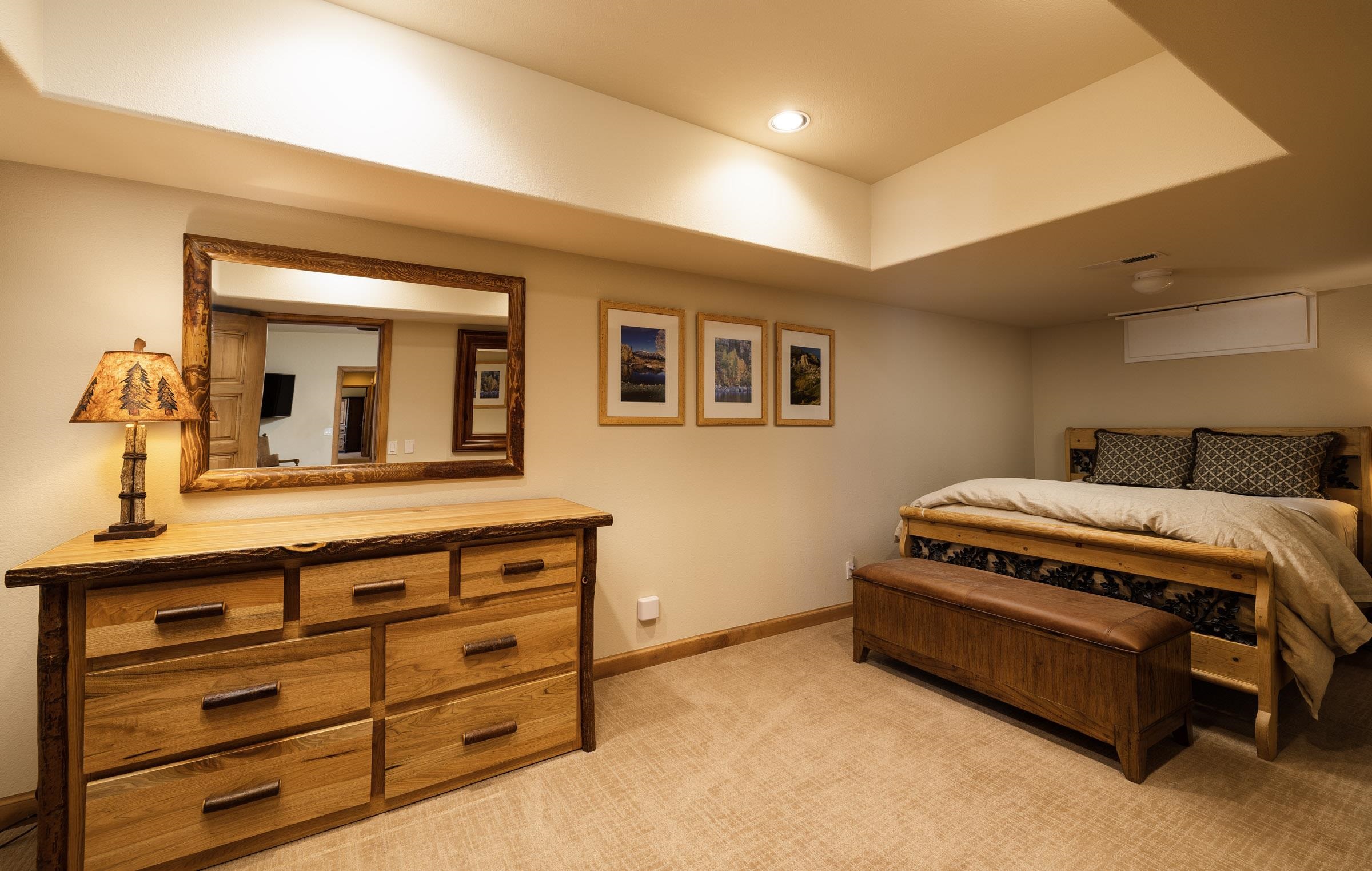 285 Juniper Road Mammoth Lakes, CA 93546 - Photo 29 of 38 a room with a bed and a dresser