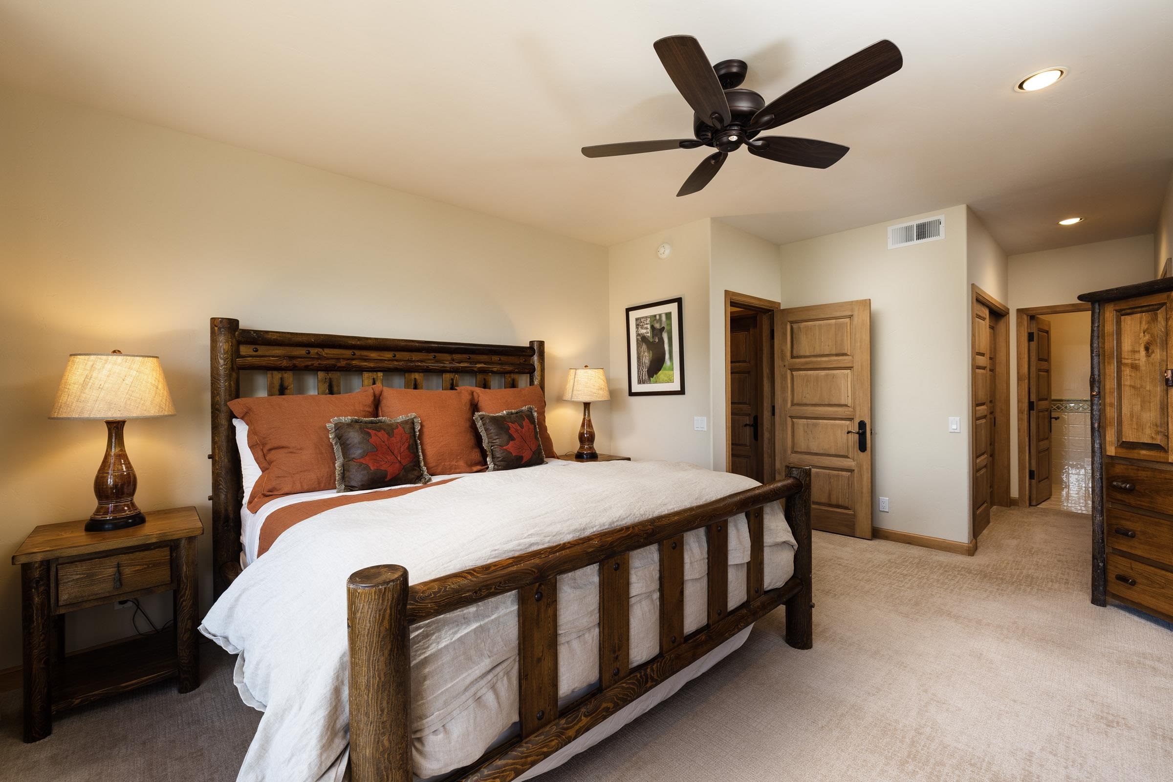 285 Juniper Road Mammoth Lakes, CA 93546 - Photo 31 of 38 a bedroom with bed and wooden floor